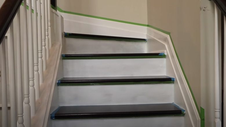 white and dark wood stairs