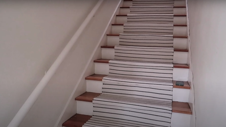 striped runner on staircase