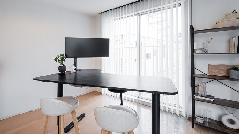 black standing desk in home office