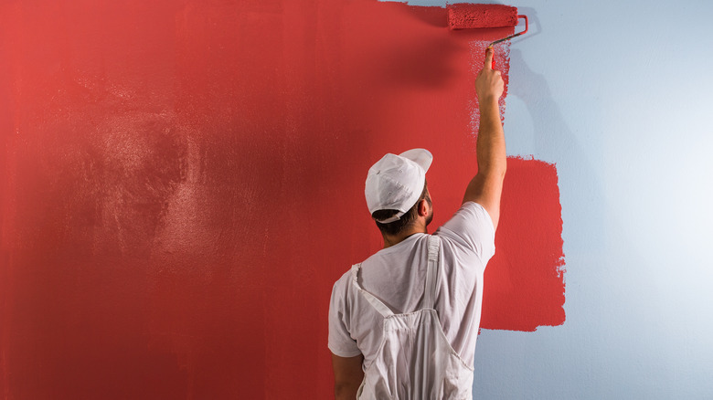 wall being painted bright red