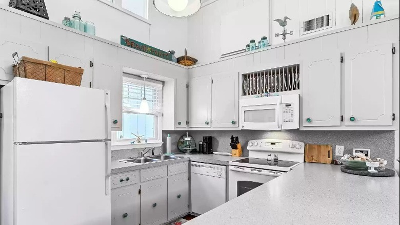 white kitchen cabinets and appliances