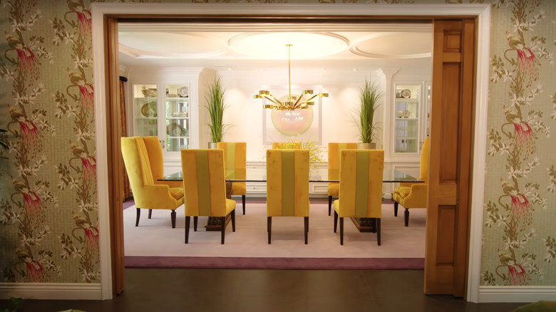 dining room with yellow chairs