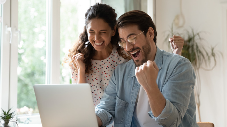 Couple looking at computer