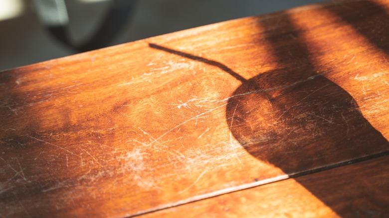 scratched wooden table