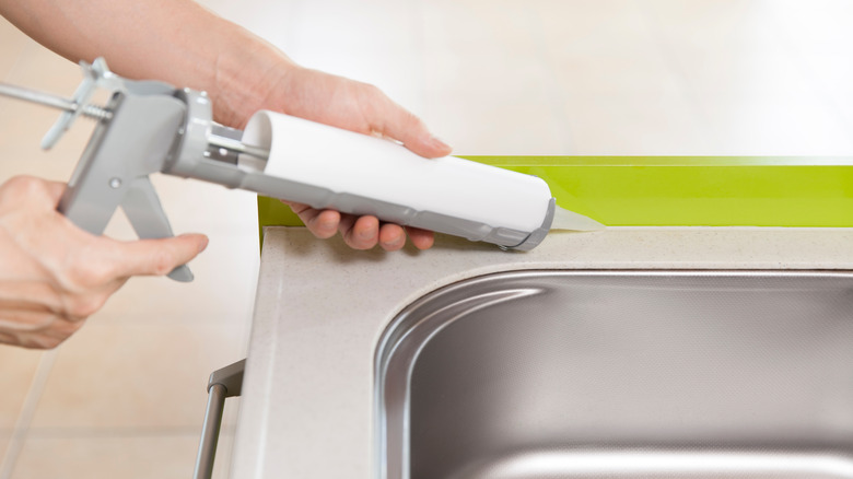 Caulking a kitchen sink