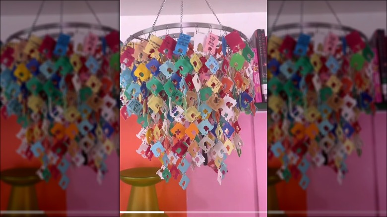 Colorful chandelier made of plastic bread tags