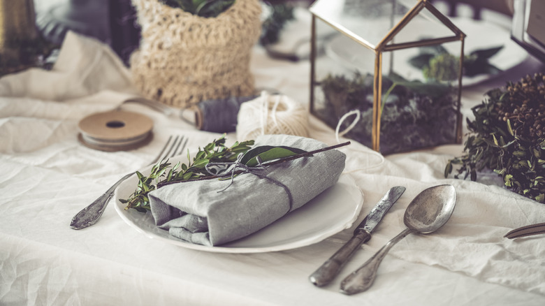 A table set with linen napkins