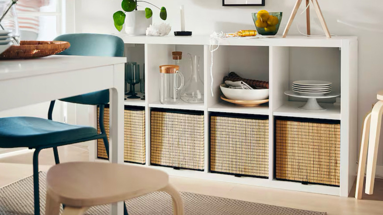 IKEA KALLAX storage system with assorted dining decor.