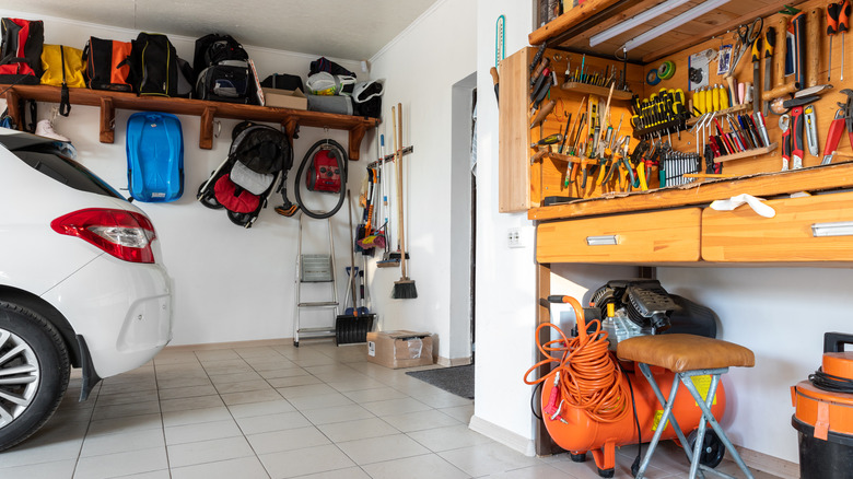 garage with tools and car