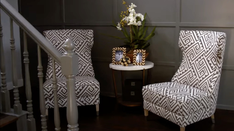 foyer with two modern chairs