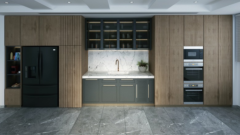 Streamlined refrigerator and oven in kitchen