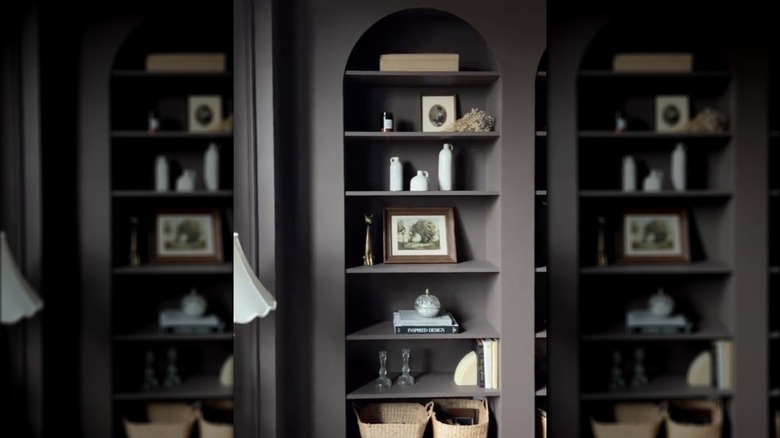 built-in arched black bookcases