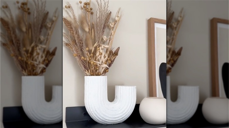 white vase on shelf