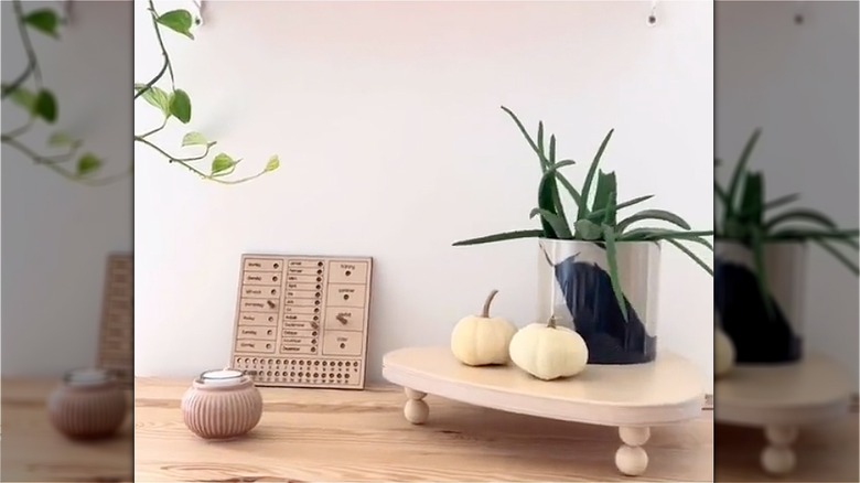 dresser with decor on top