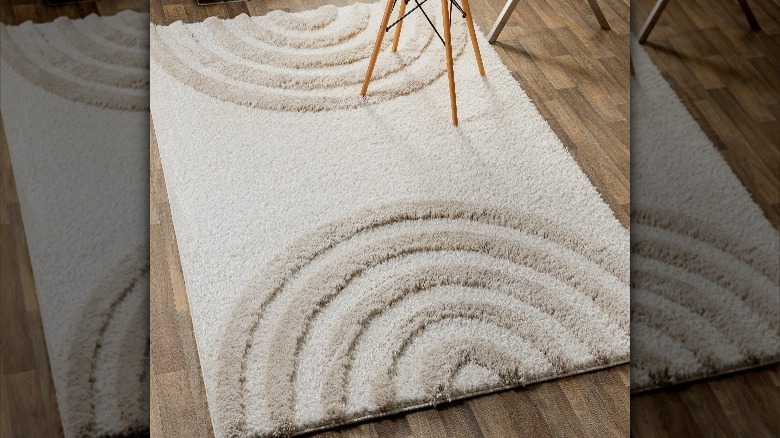 neutral rainbow shaped shag rug