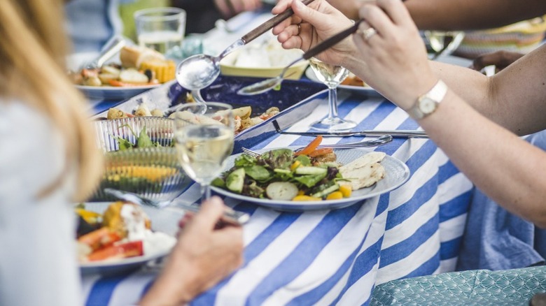 Group dining at outdoor table