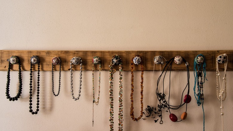 jewelry rack mounted on wall