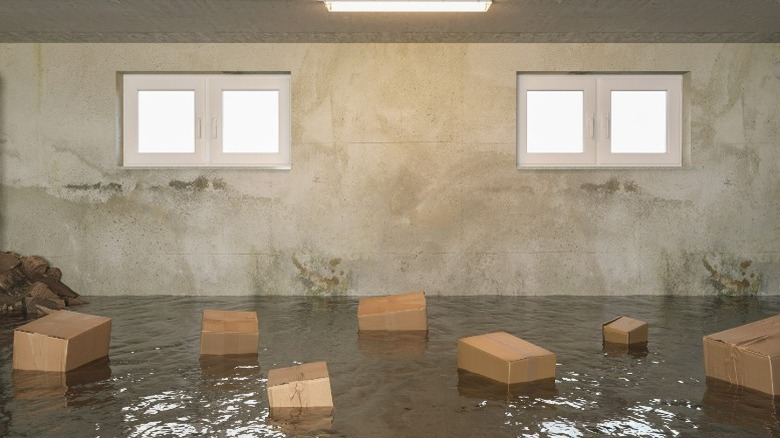 Boxes floating in a flooded basement