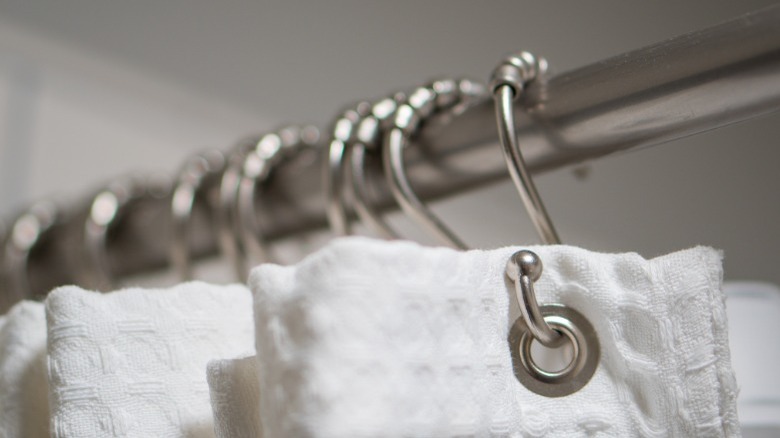 Closeup of shower rod rings