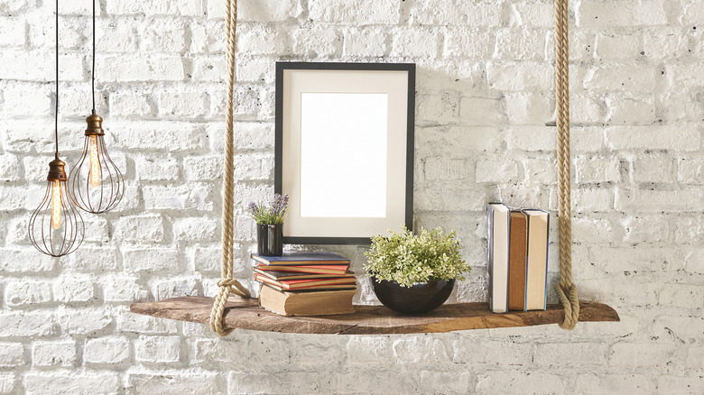 items on suspended shelf from ceiling