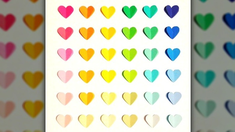 Rainbow gradient hearts on paper