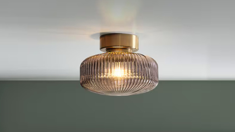 fluted glass gold base light fixture