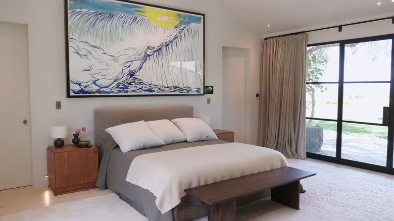 master bedroom with bold art