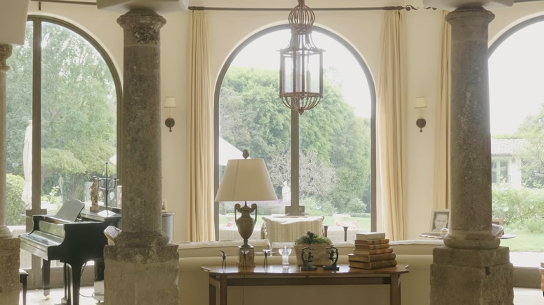 formal sunroom with piano