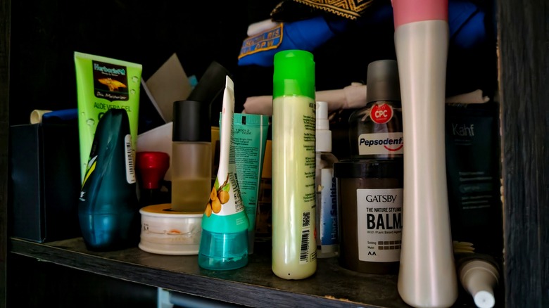 clutter in bathroom cabinet