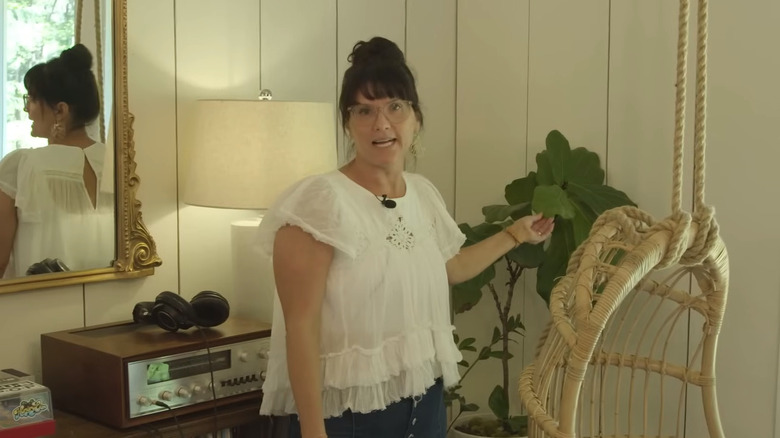 Lyndsay Lamb standing in front of her family's record player station