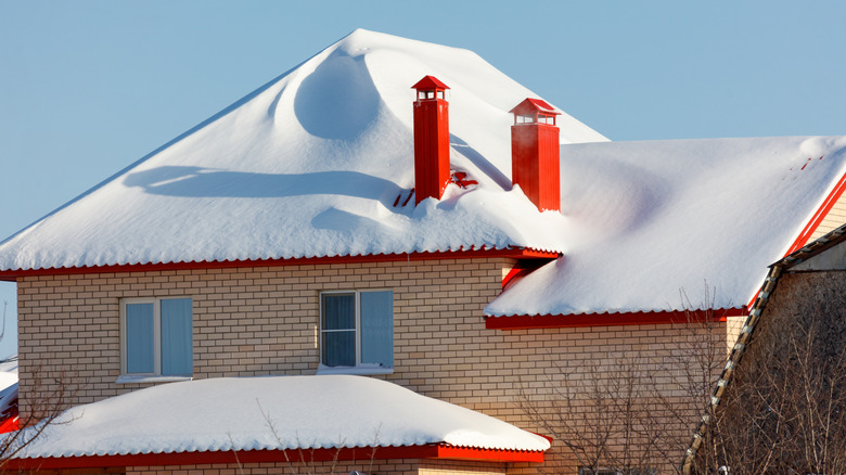 Snow on roof of home