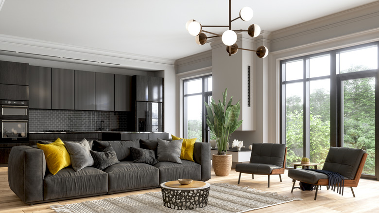 High-ceiling living room with modern chandelier