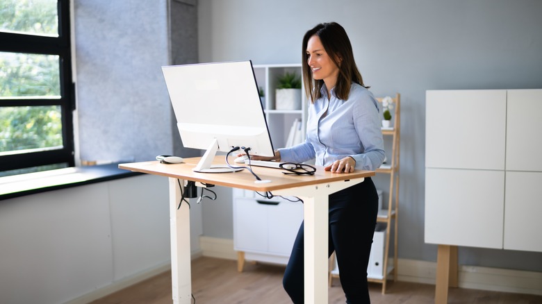 Person working at standing desk