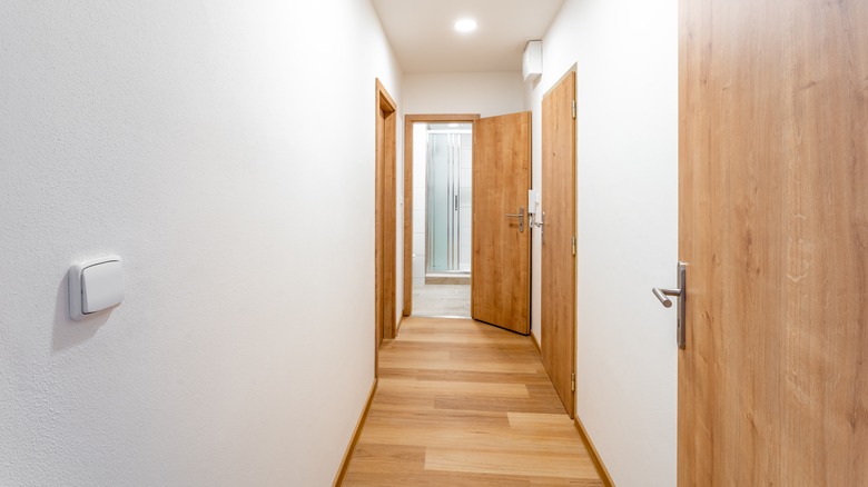 Plain hallway with recessed lighting