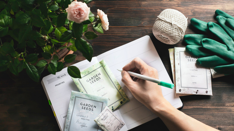 person using a garden journal