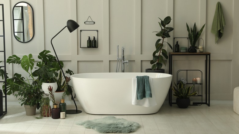 Contemporary bathroom with green accents