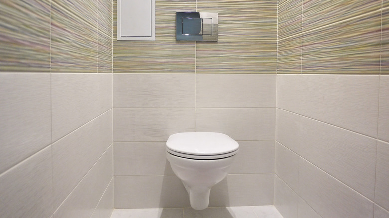 Toilet with tile enclosure