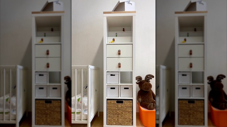 Tall KALLAX storage unit with baskets inside