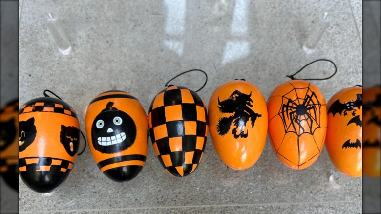 Easter eggs painted orange and black for Halloween