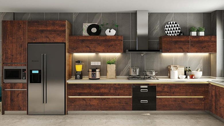 A kitchen with wallpapered cabinets