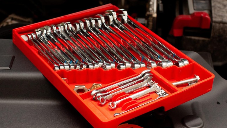 A full TOOL SORTER wrench organizers containing shiny wrenches