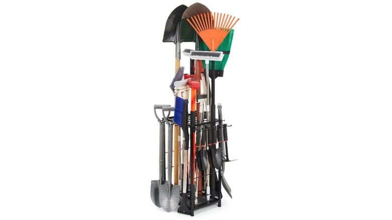 A standing Kingarage tool organizer filled with an assortment of gardening implements