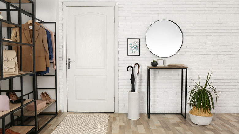 Patterned rug in front of front door