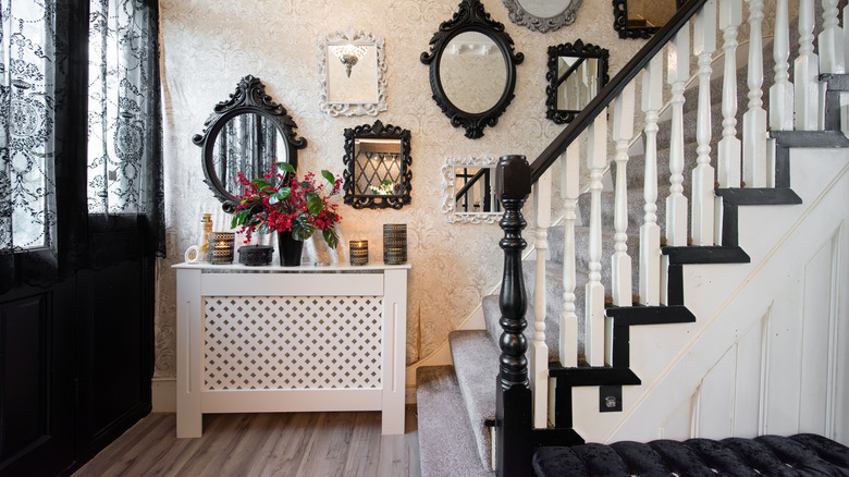 Entryway area with candles and flowers