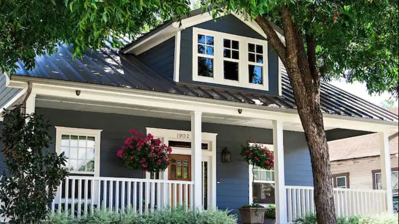 fixer upper home with porch