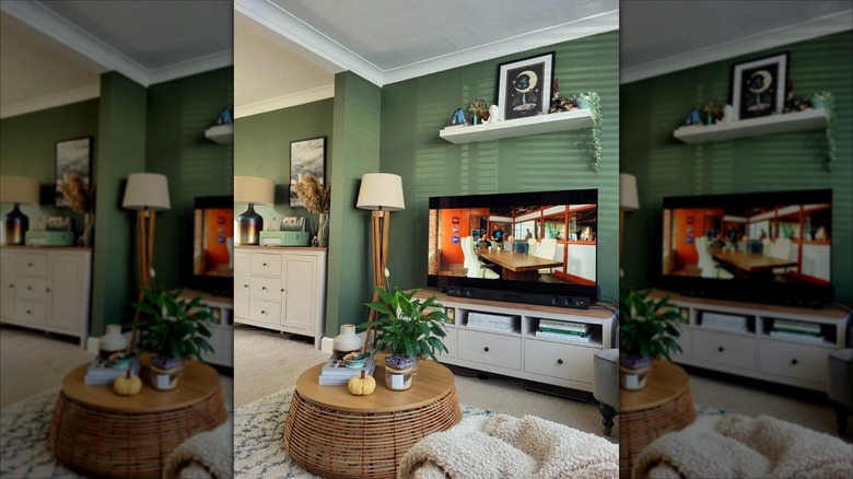 Living room with green paint on walls