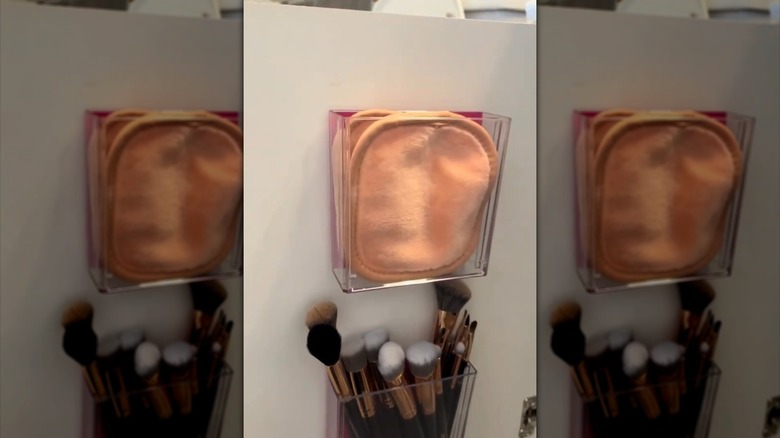 Plastic storage containers with makeup brushes