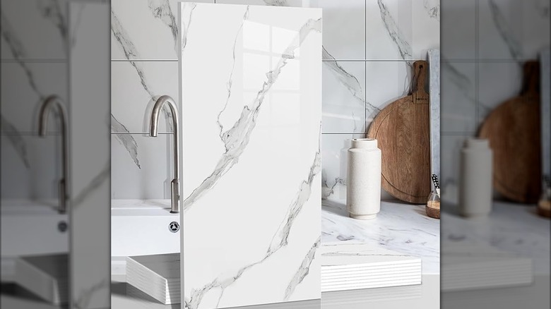 White kitchen with a chic marble backsplash