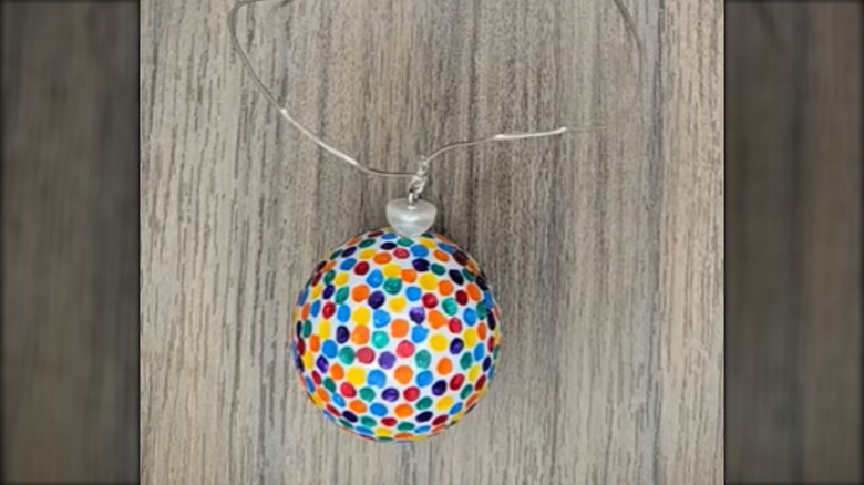 screenshot of multicolored painted golf ball ornament