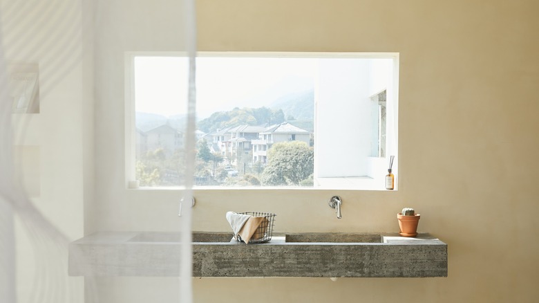 Slim floating concrete sinks 